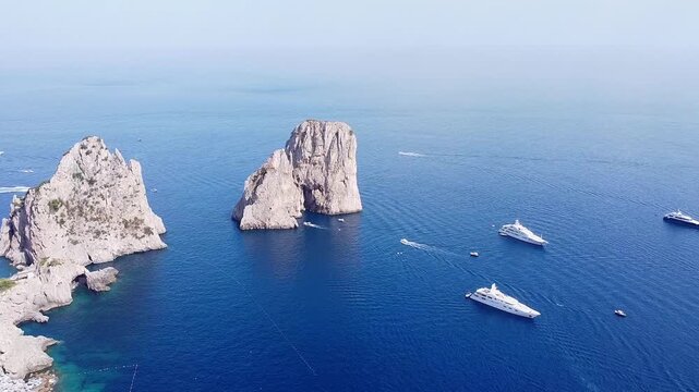 Aerial View of Faraglioni Rocks and Capri Coastline with Boats