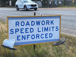 Road speed limits enforced sign
