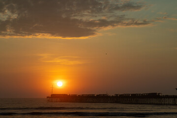 Pier of Pimentel at sunset in Lambayeque, Peru