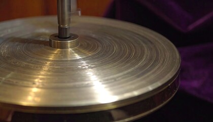 Close Up Of A Silver Guilloch? Disc With Intricate Swirl Pattern