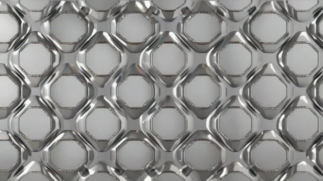 Shiny metal surface with octagonal indentations arranged in a repeating geometric pattern design seamless patterns backgrounds video