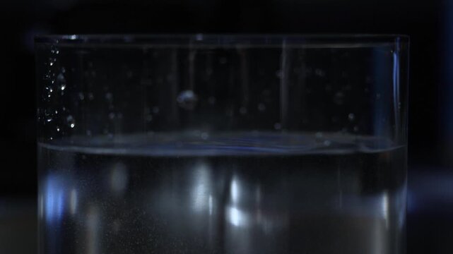 Close-Up Of Water Dripping Into Cup Slow Motion