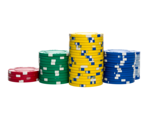 Four stacks of colorful plastic discs, likely gambling tokens, on a black background
