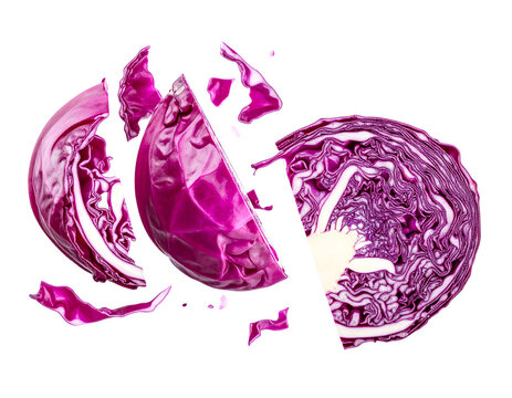 A red cabbage in pieces, with a dark background