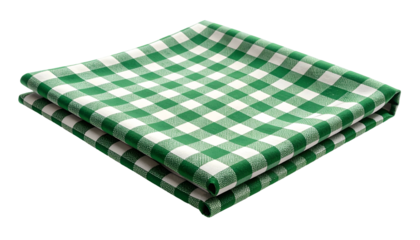 Folded green and white checkered cloth, layered atop each other, against a black backdrop