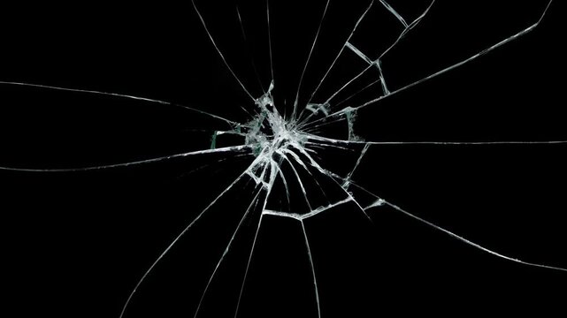 Breaking glass motion graphics. Cracked glass fracture effect Black background, Realistic Glass impact crack with detailed fractures on a black background. 
Glass Shattered and Breaks by Bullet Hit,