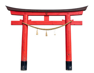 Japanese Shinto shrine gate with red pillars, rope, and bells