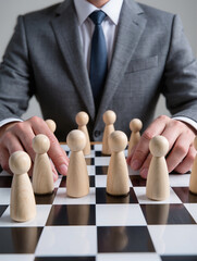 Businessman hand choose people with outstanding ability from the crowd and Successful team leader concept