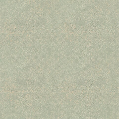 Close-up view of a textured surface with a speckled, light-green and beige appearance.