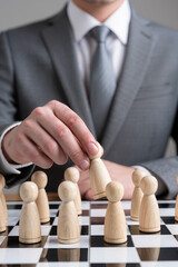 Businessman hand choose people with outstanding ability from the crowd and Successful team leader concept