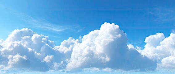 Fluffy white cumulus clouds against a vibrant blue sky (1)