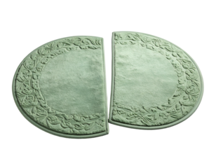 Two symmetrical halves of a decorative object with floral detailing