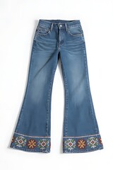 A pair of 1970s flared jeans with embroidered patterns on the hem