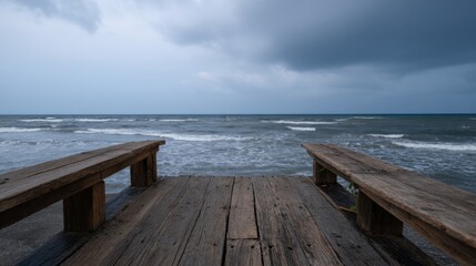 Old Wooden Pier Under Stormy Clouds with Swirling Waves and Dramatic Sky
