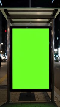 Digital Ad Placement with bus stop advertising billboard green screen at night distortion, overlay, glitch, static noise, scan lines on black background, 4k animated video loop