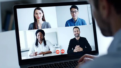 Close-up shot of a man video conferencing with three colleagues on a laptop in a modern office with a professional mood. - Powered by Adobe
