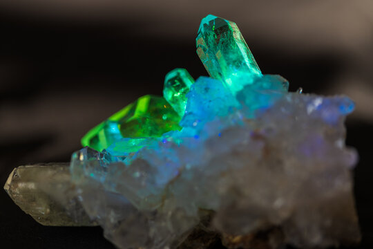 Natural quartz crystals in turquoise prism light