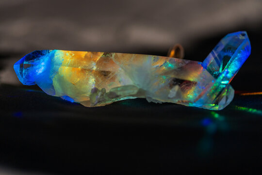 Quartz crystal points in blue prism light