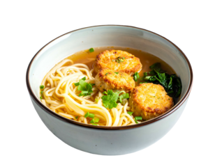 A ceramic bowl of noodle soup with fish cakes and greens