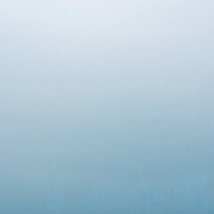 Soft gradient of blue and white creating a serene and calming background for any project