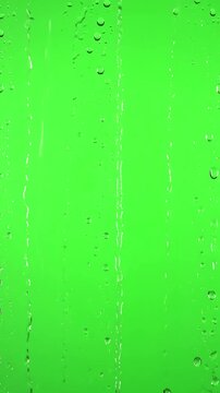 Rain on Glass - Chroma Key Ready with water rainfall drops falling window over green screen distortion, overlay, glitch, static noise, scan lines black background, 4k animated video loop