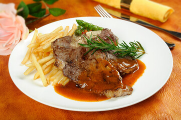 Grilled Steak Slices and Knife Overhead Composition