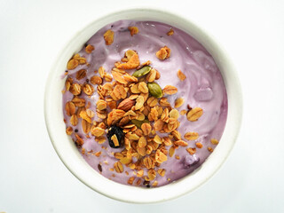Yogurt Granola grains and Almonds bean in bowl on white background. Food for energy breakfast, brunch snack. Healthy ingredients food contains nutrition protein, vitamins. lifestyle restaurant