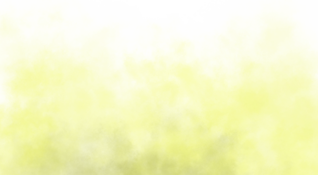 Abstract yellow smoke swirling against a dark background