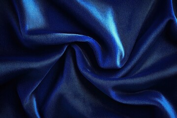 Fototapeta premium Close-up of smooth, shiny blue satin fabric with gentle folds creating a soft, elegant texture and reflective highlights