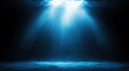 Underwater scene with bright sunlight rays penetrating deep blue water creating a serene and mysterious oceanic atmosphere