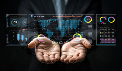 Businessman presenting futuristic digital data analytics with graphs, world map, and holographic interface in hands showcasing modern technology and insights
