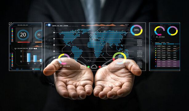 Businessman presenting futuristic digital data analytics with graphs, world map, and holographic interface in hands showcasing modern technology and insights