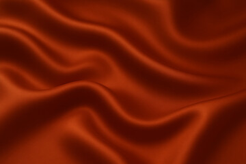 Rich Burnt Orange Silk Fabric with Gentle Ripples and Glossy Satin Texture &mdash; Warm Elegant Background for Creative Luxury Designs