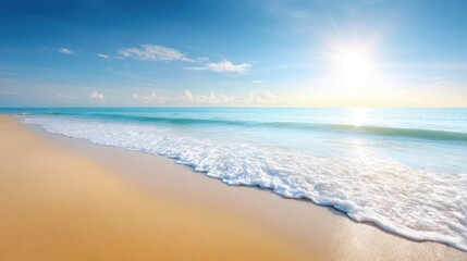 Fototapeta premium Serene Beach Landscape with Gentle Waves Under a Clear Blue Sky and Golden Sand during Sunset
