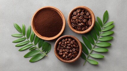 Coffee Grounds, Roasted Coffee Beans, and Green Leaves on Gray Background in Earthy Clay Bowls for Fresh Beverage or Culinary Use