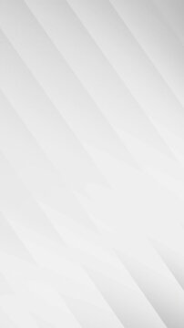 A modern vertical motion graphic featuring subtle diagonal lines creating a shaded texture and fractal effect on a light gray background.
