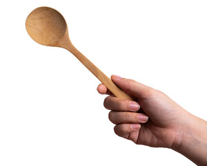 Female hand holding a wooden spoon isolated on white background.