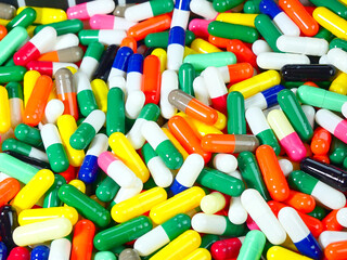 Many multi-colored capsules.