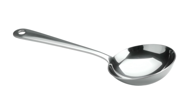 Stainless steel serving spoon, light reflection on polished surface