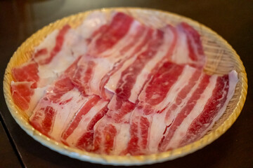 Close up of sliced brisket, raw meat. prepared for cooking