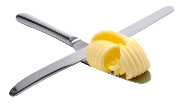 Butter curl on crossed silver knives, studio lighting