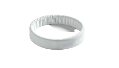 Simple white terrycloth headband isolated against a black backdrop