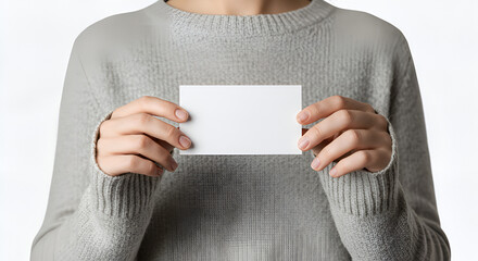 Woman presenting blank card in hands for business, isolated on white backdrop
