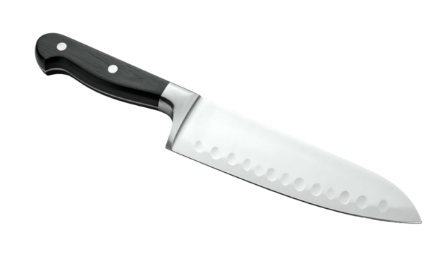 Chef's knife steel blade, black handle, against black background