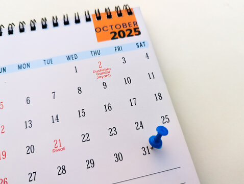 31st october date marked with pushpin on calendar