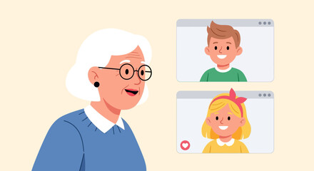 Elderly grandmother happily video chatting with her young grandchildren, a boy and a girl, on a computer.