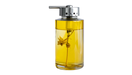 Glass bottle with golden fluid and flower stem, metal pump