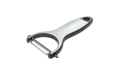 Vegetable peeler with silver handle on a black background