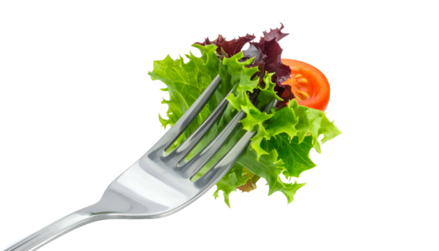 Salad on a fork; green lettuce, red tomato, isolated on black