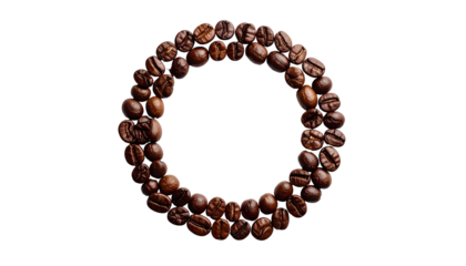 Dark roasted coffee beans artfully arranged in a perfect circular form against a black backdrop